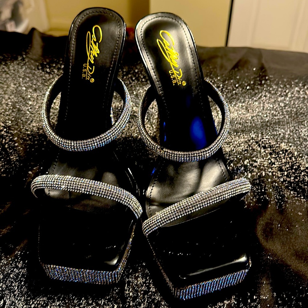 Size 10 Black Platform Heel Shoes. Like-new condition, worn once.